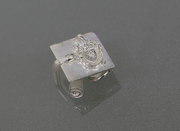 Charm Graduation with Silver Crest